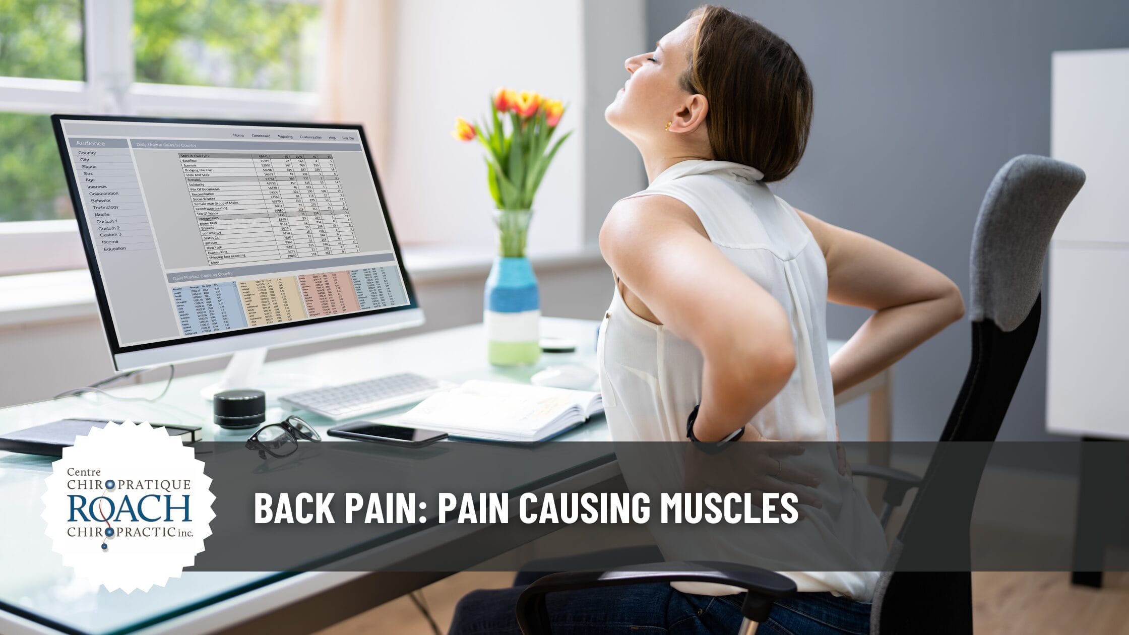 a woman sitting at her desk with back pain