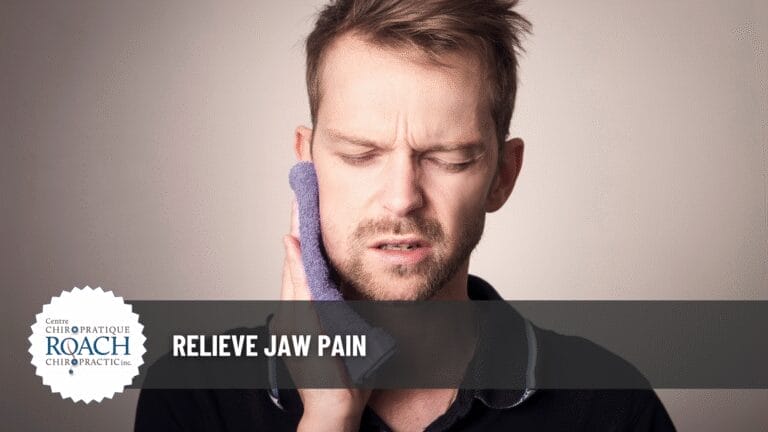 Relieve Jaw Pain 8 a man holding a cloth to his face, experiencing jaw pain.