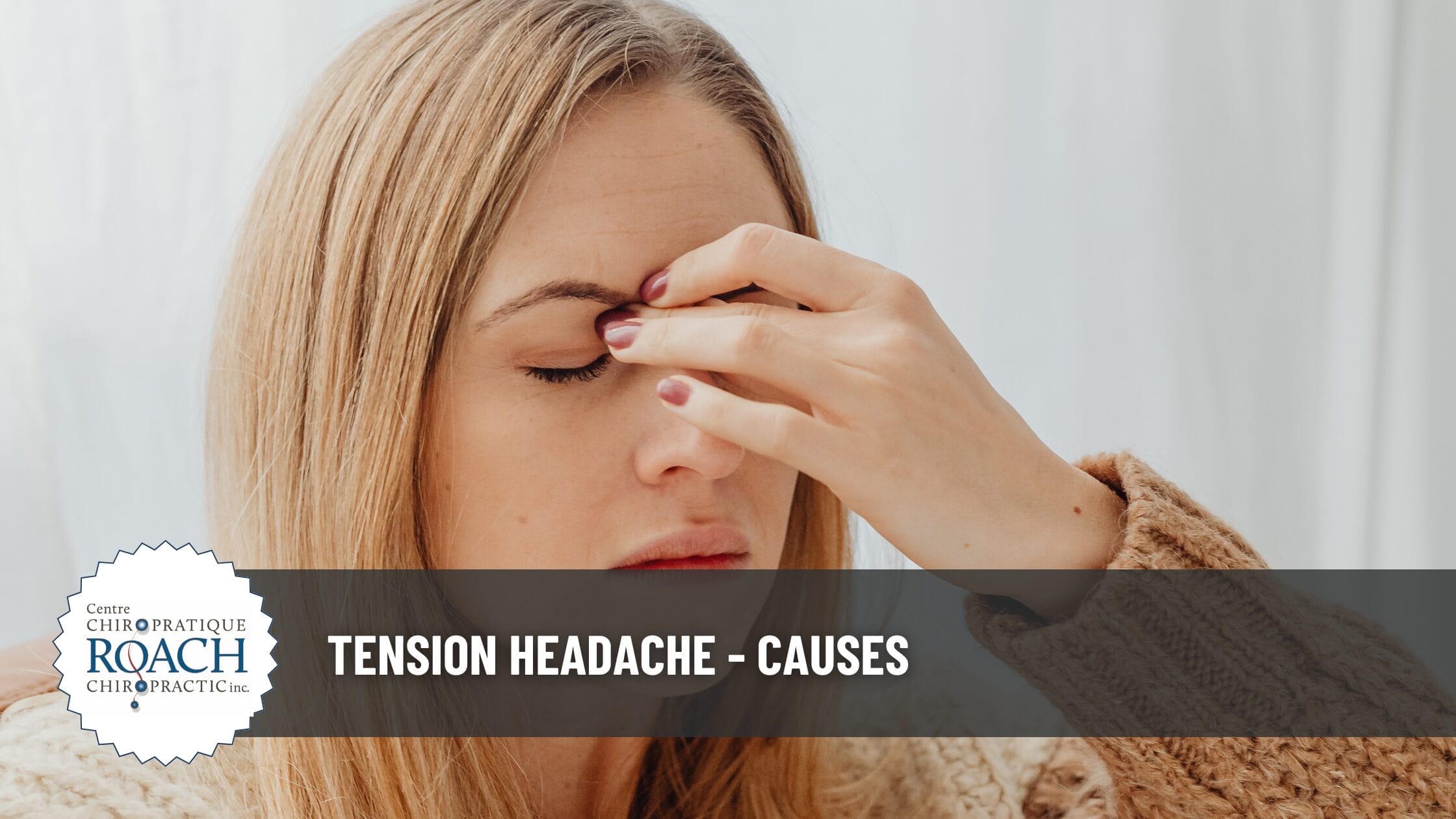 a woman pinching between her eyes experiencing a tension headache