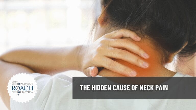 The Hidden Cause of Neck Pain 4 a woman grasping the back of her neck in pain