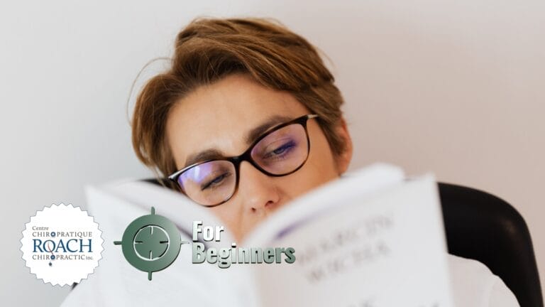 a person reading a beginners guide to creating lasting chiropractic habits