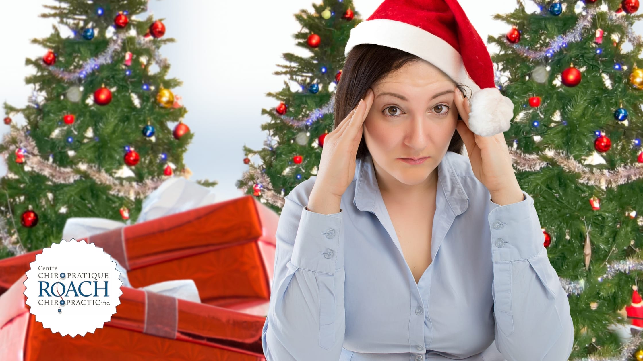 a woman with her hands pressed against her temples experiencing stress during the christmas holidays
